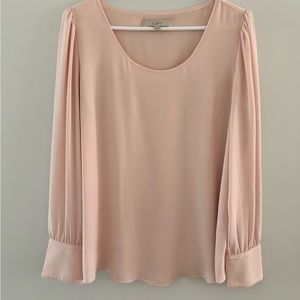 Pale pink long sleeve blouse with pearl buttons